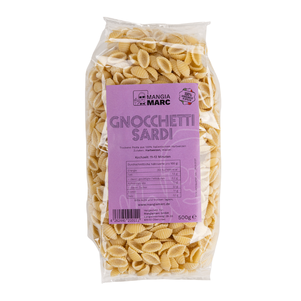 Eine 500g Packung Gnocchetti Sardi, die durch die transparente Verpackung ihre charakteristische Muschelform und die gerillte Oberfläche erkennen lässt.