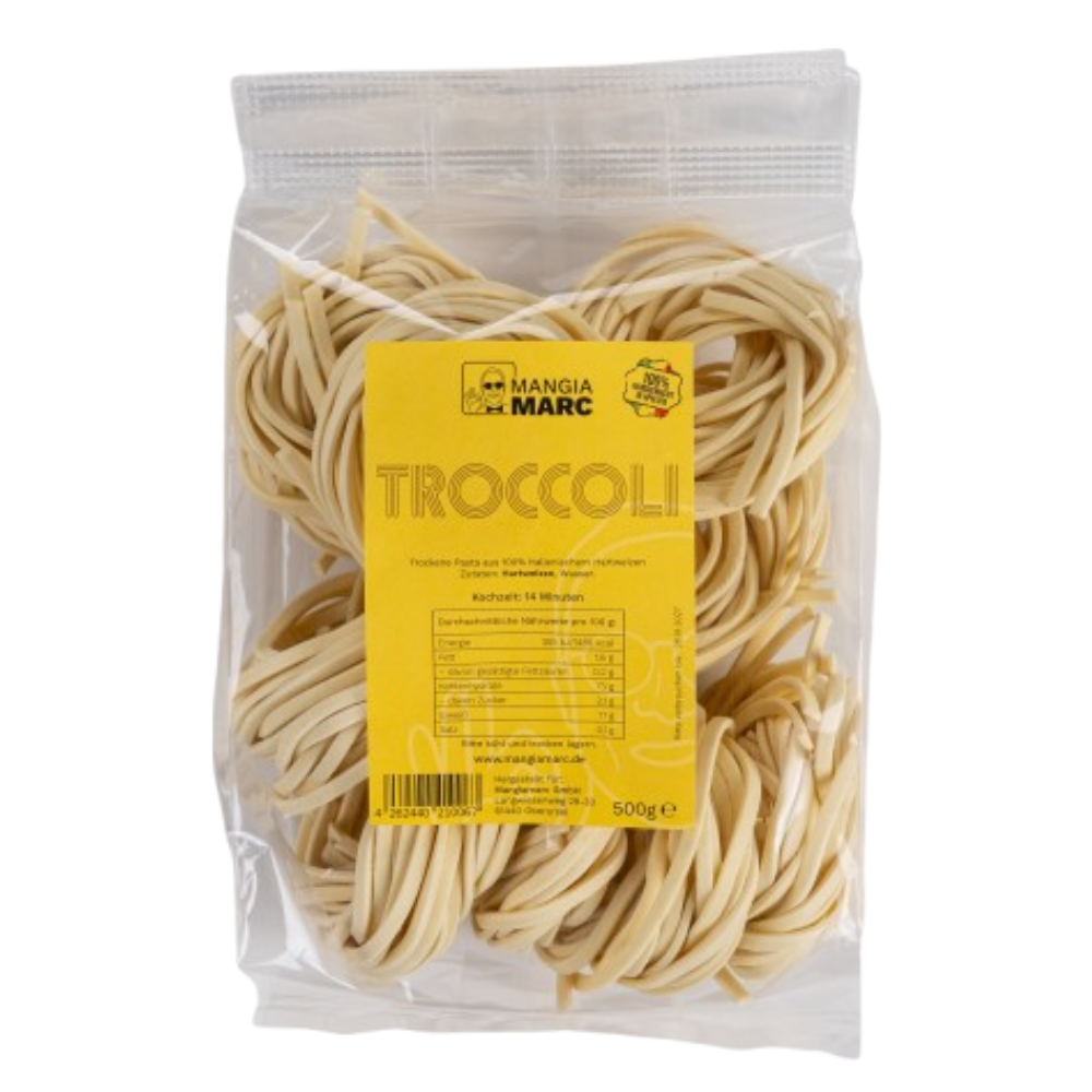 Eine 500g Packung handgemachter Troccoli, deren raue, dicke Nudeln durch die transparente Verpackung sichtbar sind.