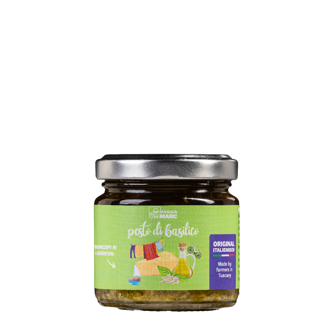 Ein Glas MangiaMarc Original Basilikum-Pesto mit frischem Basilikum und Olivenöl, das die reiche grüne Farbe und die cremige Textur zeigt.